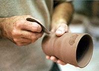 roughing a mug for the handle